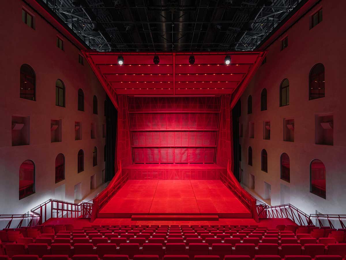 Bold red concert hall makes a statement as a harmonious blend of history and modern technology 
