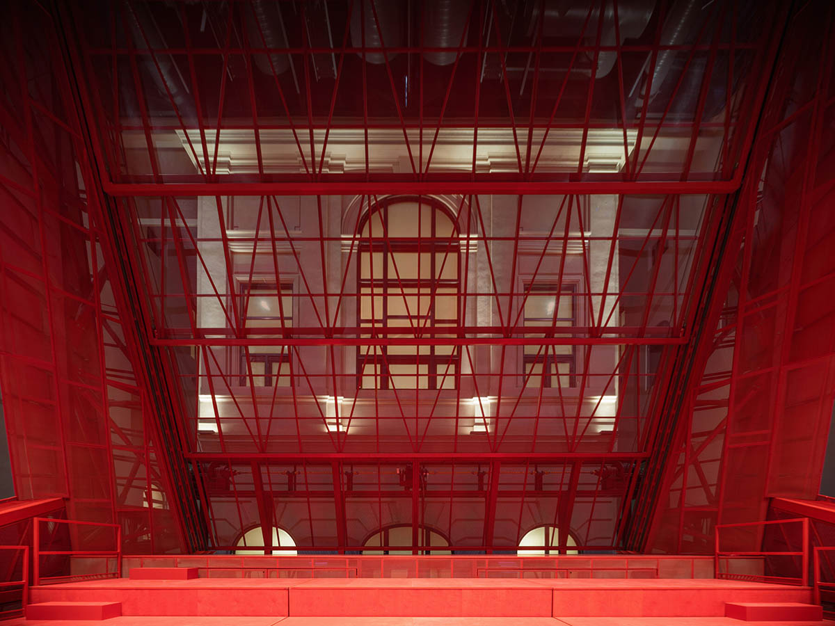 Bold red concert hall makes a statement as a harmonious blend of history and modern technology 