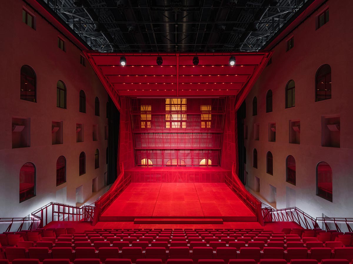 Bold red concert hall makes a statement as a harmonious blend of history and modern technology 