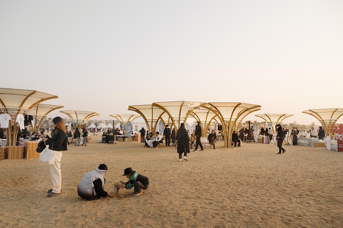 Also Architects creates art museum made of umbrella-like bamboo structures and undulating fabric