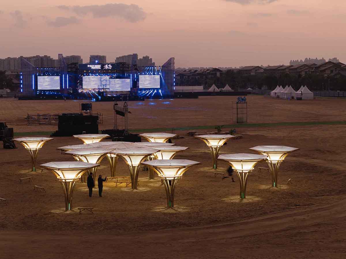 Also Architects creates art museum made of umbrella-like bamboo structures and undulating fabric