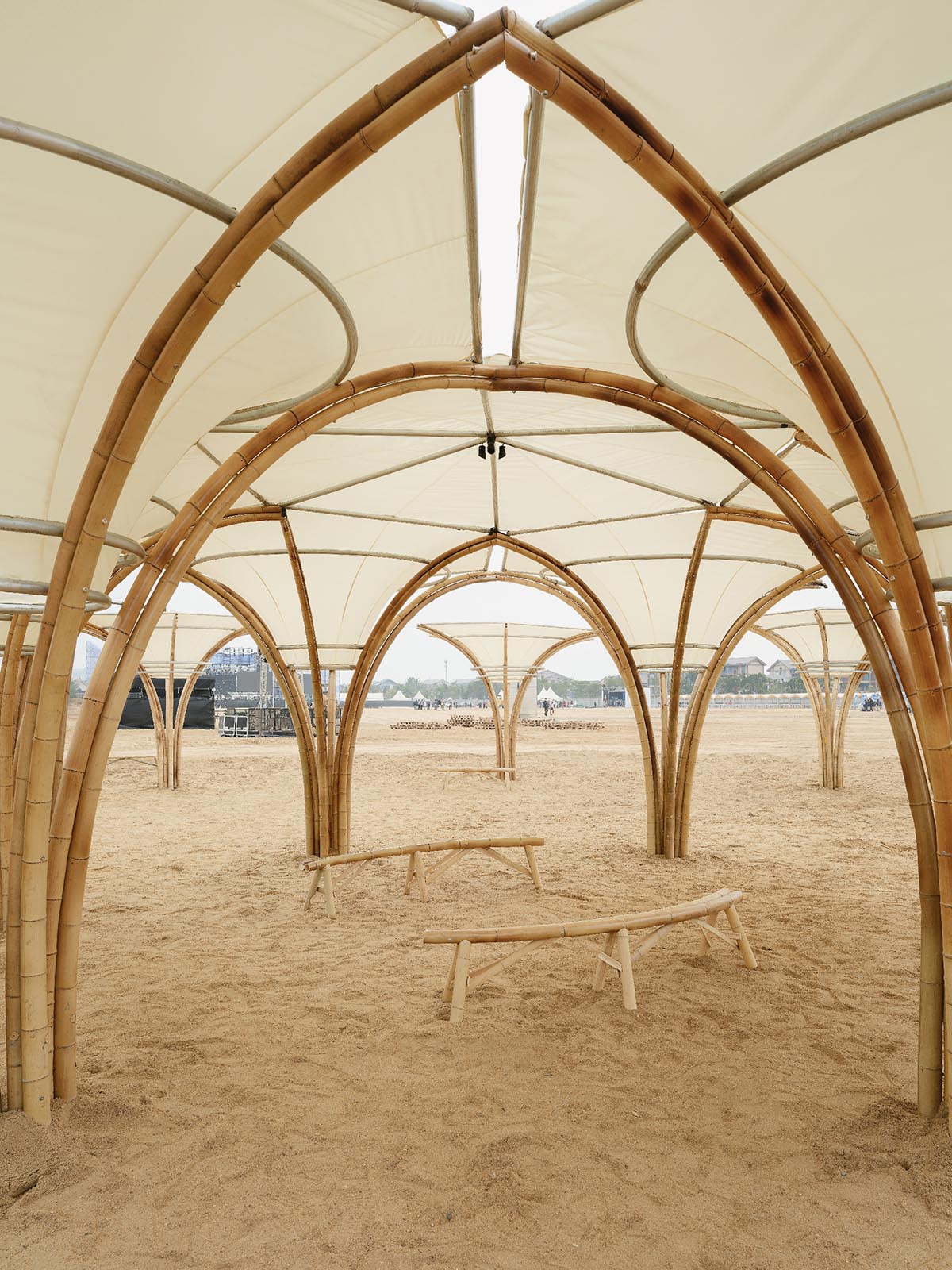 Also Architects creates art museum made of umbrella-like bamboo structures and undulating fabric