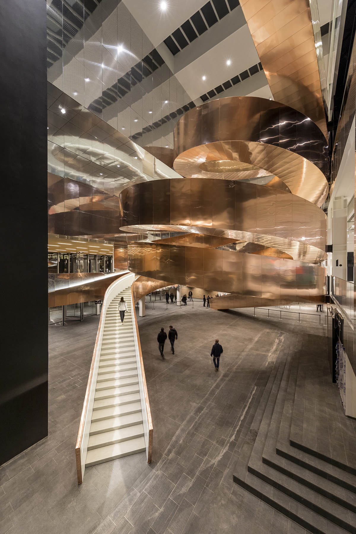 Visitors experience copper-clad Helix staircase in CEBRA-designed Experimentarium in Copenhagen