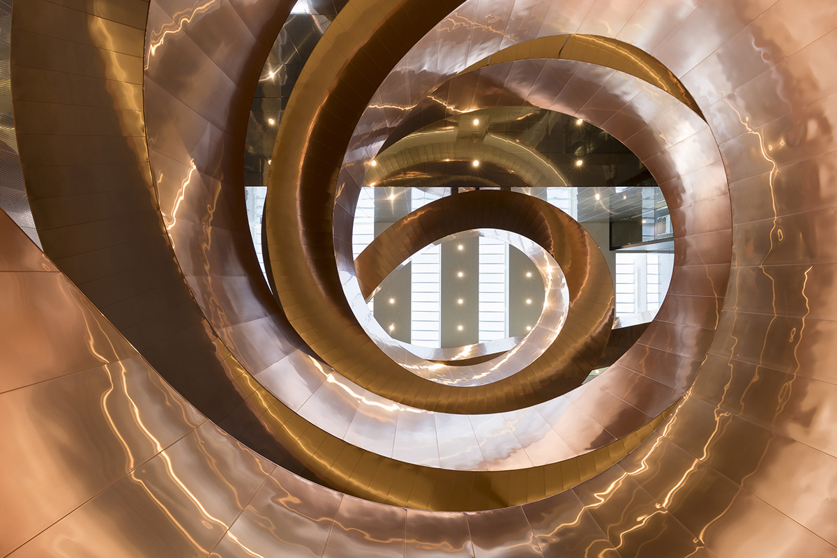Visitors experience copper-clad Helix staircase in CEBRA-designed Experimentarium in Copenhagen