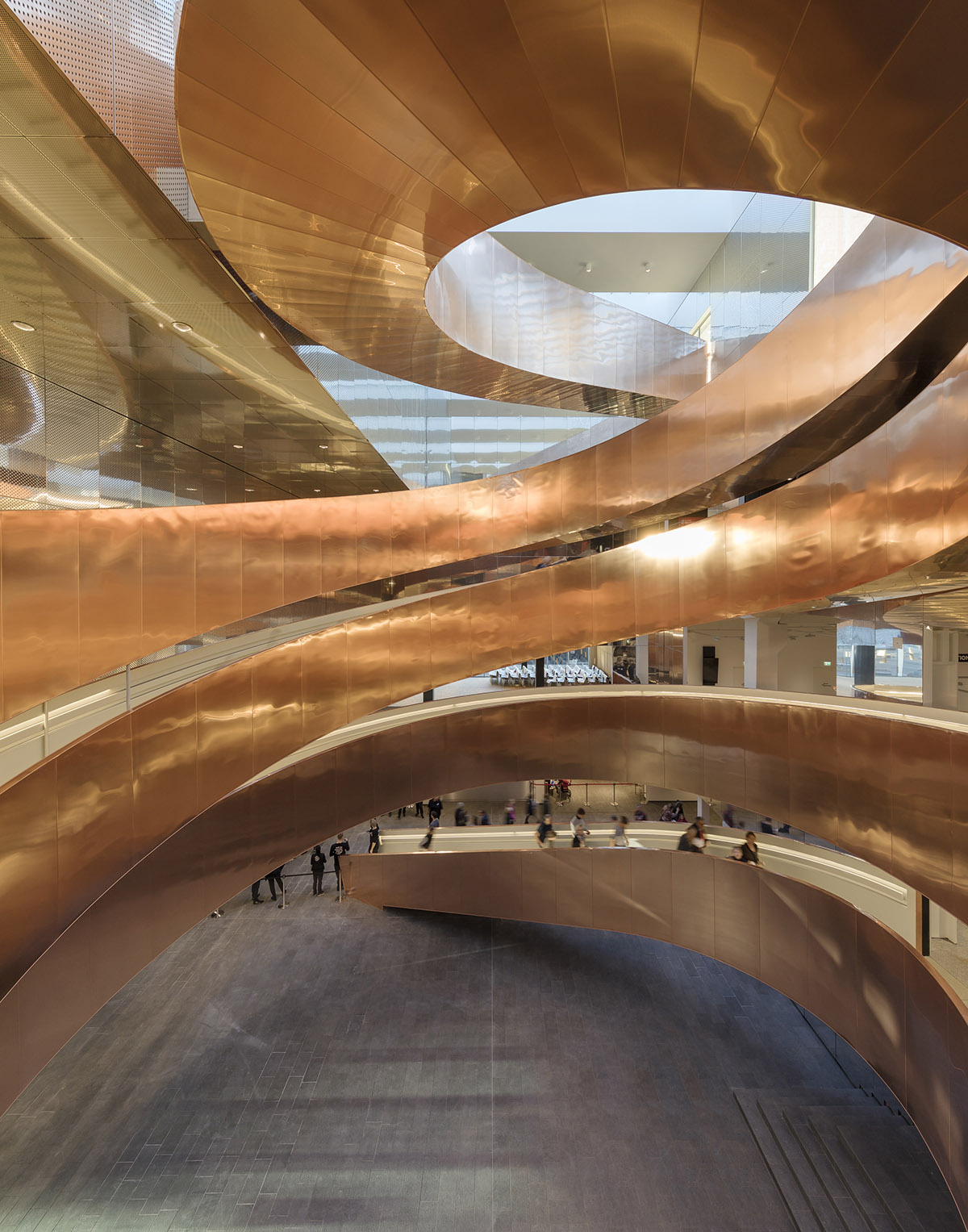 Visitors experience copper-clad Helix staircase in CEBRA-designed Experimentarium in Copenhagen