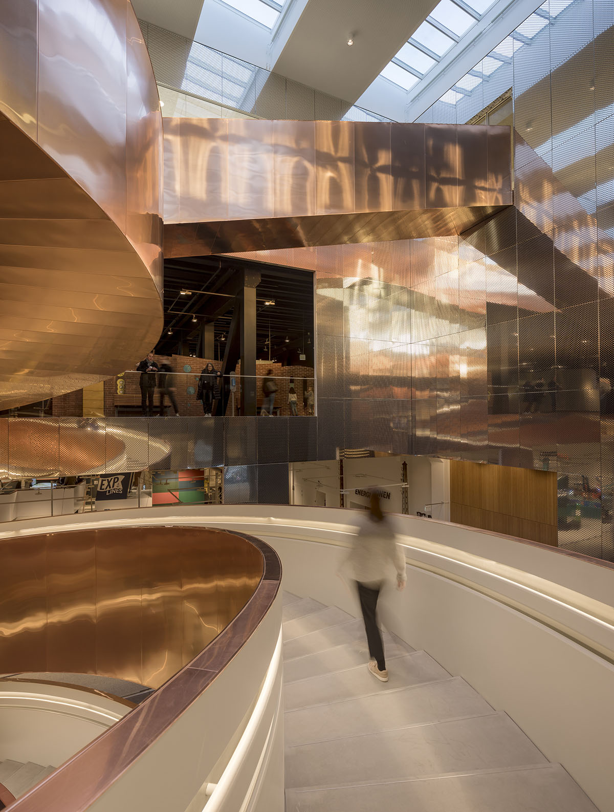 Visitors experience copper-clad Helix staircase in CEBRA-designed Experimentarium in Copenhagen