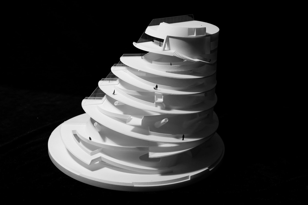 OPEN reveals its curvilinear Sun Tower with sliced silhouette on Yantai coast