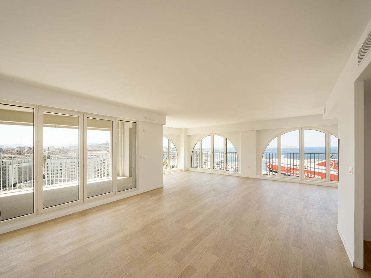 PietriArchitectes wraps residential tower with white concrete vaults referencing to the Mediterranean