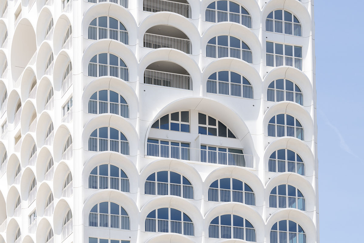 PietriArchitectes wraps residential tower with white concrete vaults referencing to the Mediterranean