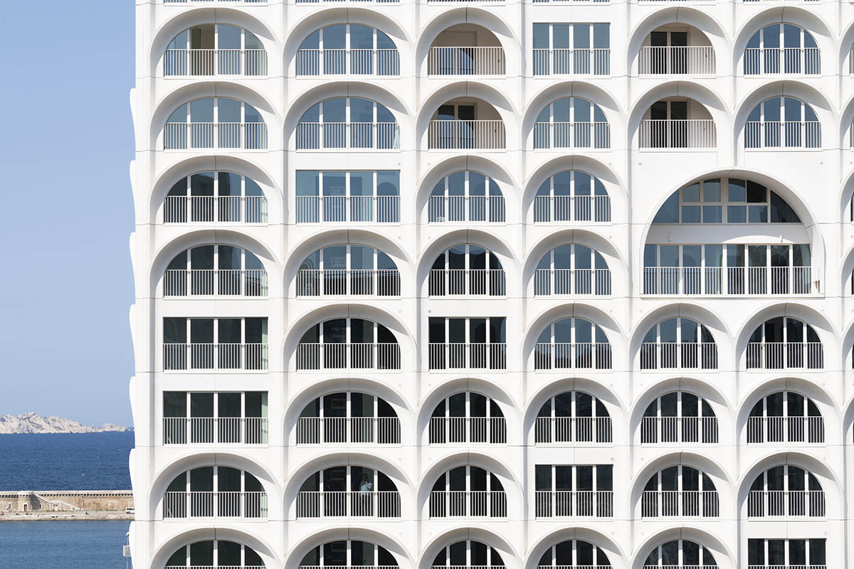 PietriArchitectes wraps residential tower with white concrete vaults referencing to the Mediterranean
