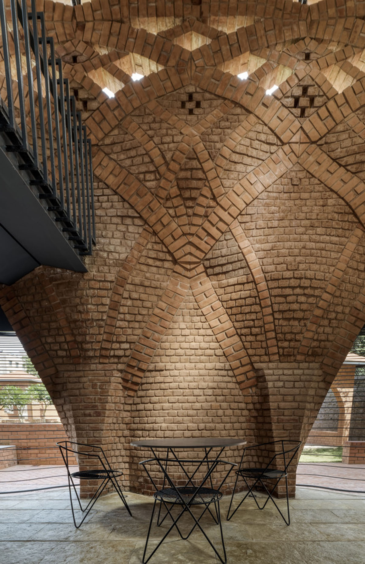PMA madhushala's community center features undulating and artistic brick walls in Pune