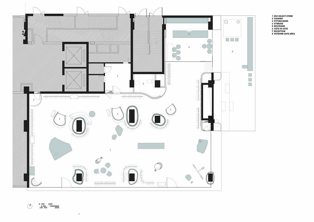 Cheese-like and stone tables with pinkish quirky-shaped elements add more personality to DSC store