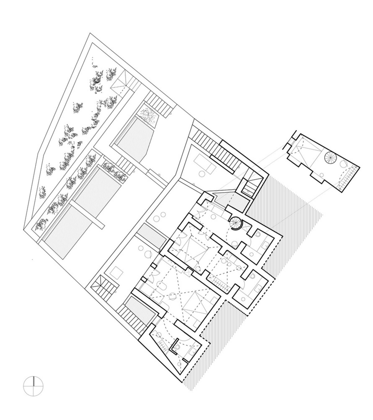 Kapsimalis Architects built castle-like hotel almost disappearing it on a steep hillside of Oia