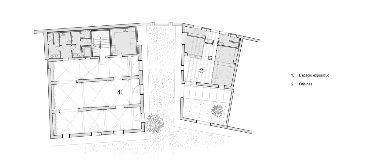 Aigua de Vilajuïga restored with vaulted bricks and exposed concrete bringing light into the space