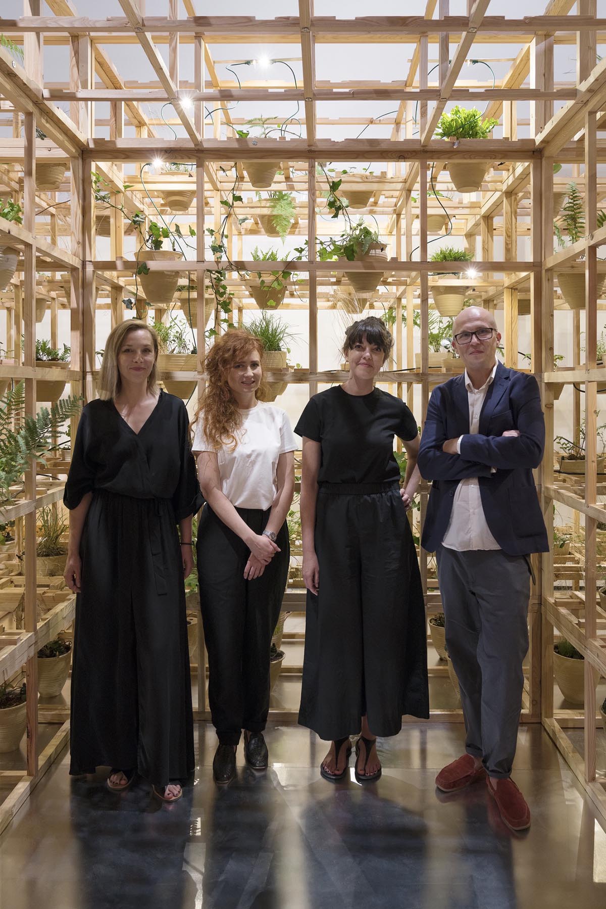 Polish Pavilion reveals wooden matrix installation with terracotta pots at Triennale Milano 2022