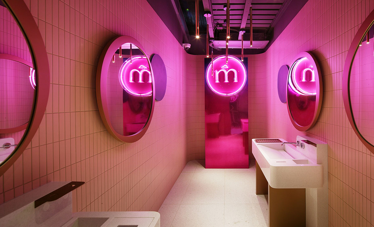 Collective B's beauty shop in South Korea features pink-hued colors and layered walls