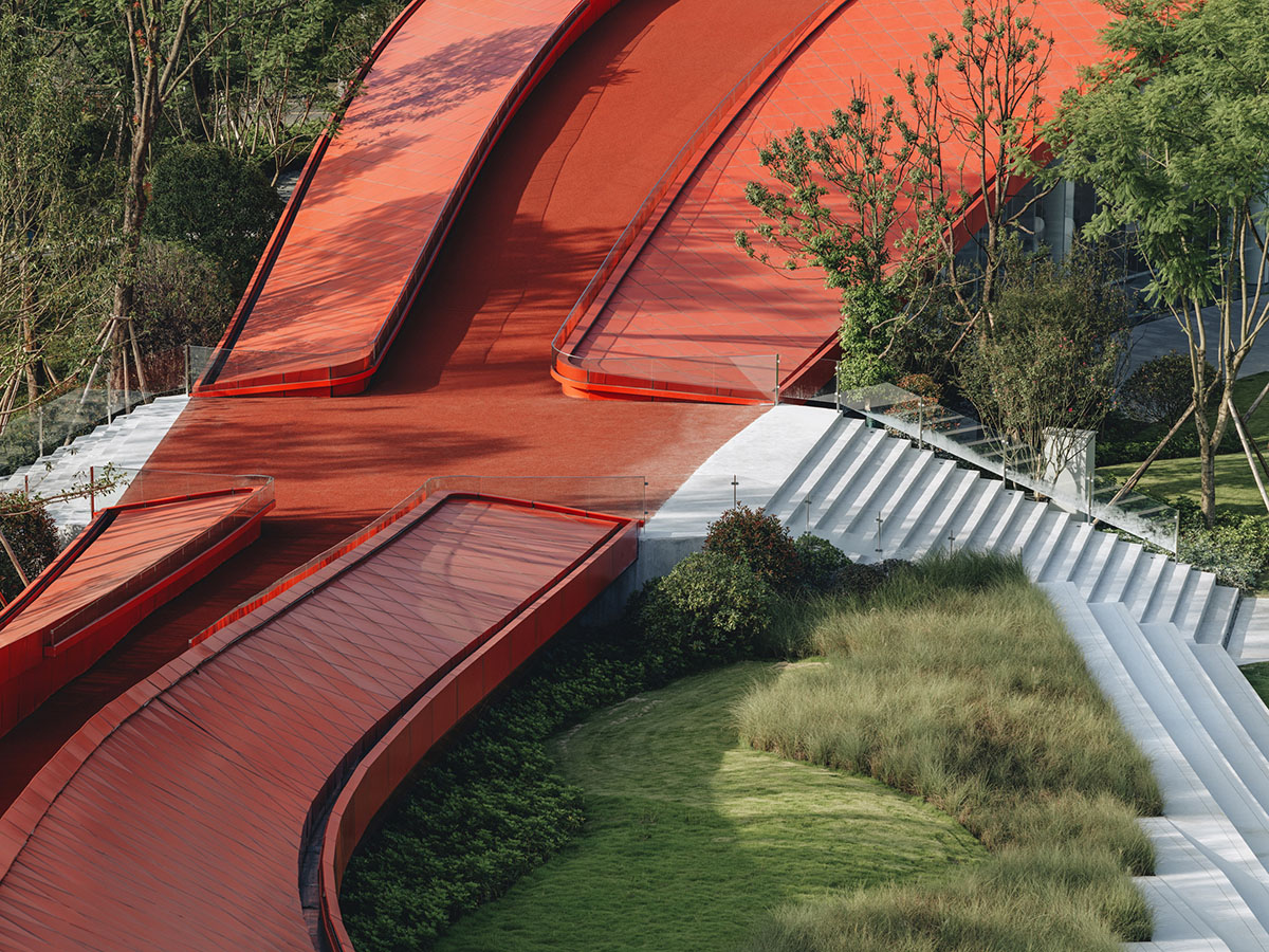 Sinuous red roof combines technology museum and reception center in Chengdu by Powerhouse Company
