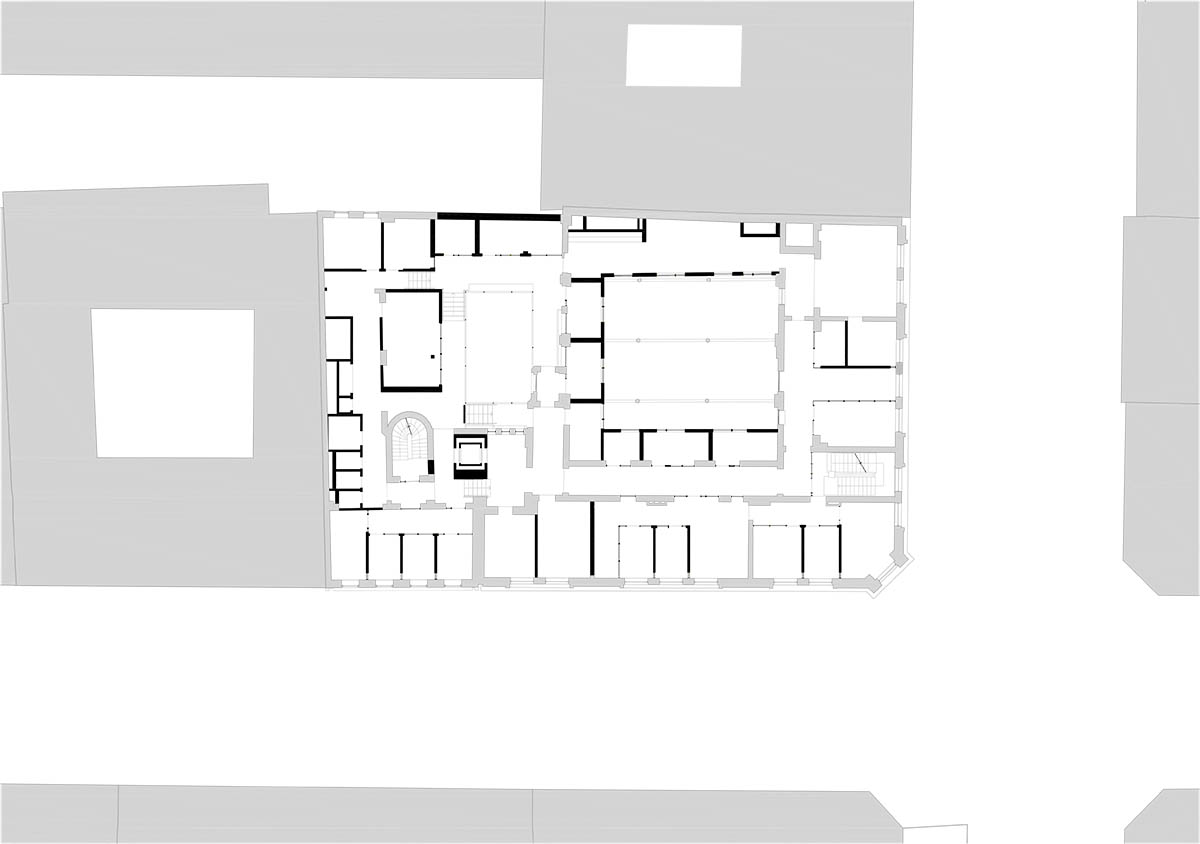 Atelier Oslo and KIMA Arkitektur restore former warehouse as a press house with light-lit atrium