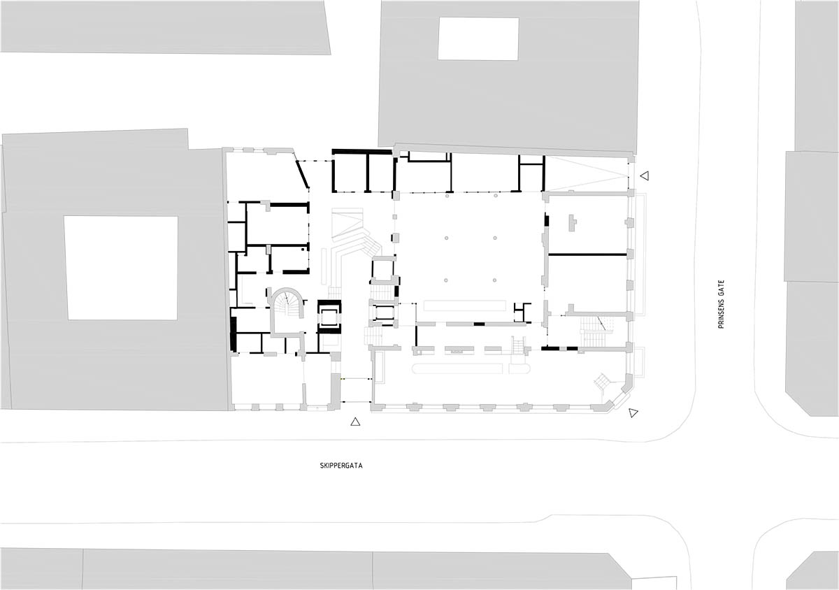 Atelier Oslo and KIMA Arkitektur restore former warehouse as a press house with light-lit atrium