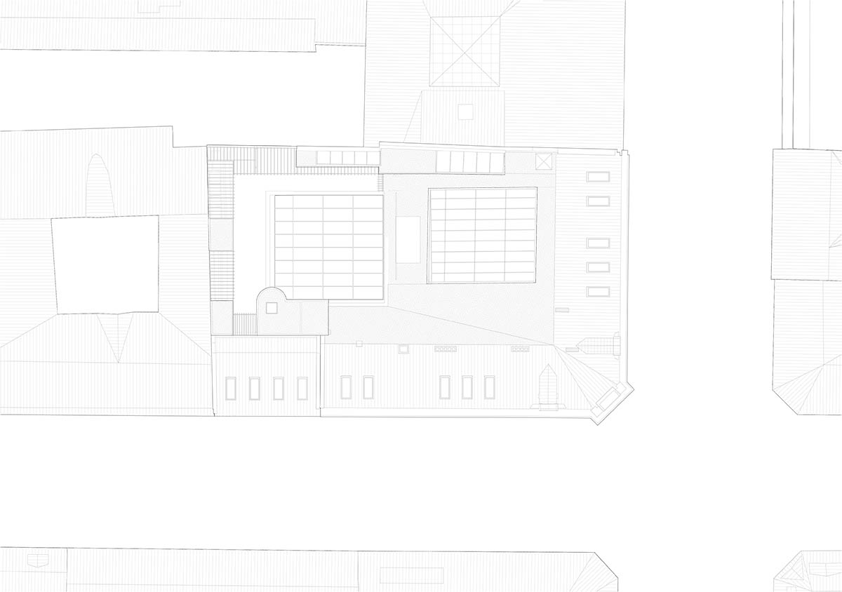 Atelier Oslo and KIMA Arkitektur restore former warehouse as a press house with light-lit atrium