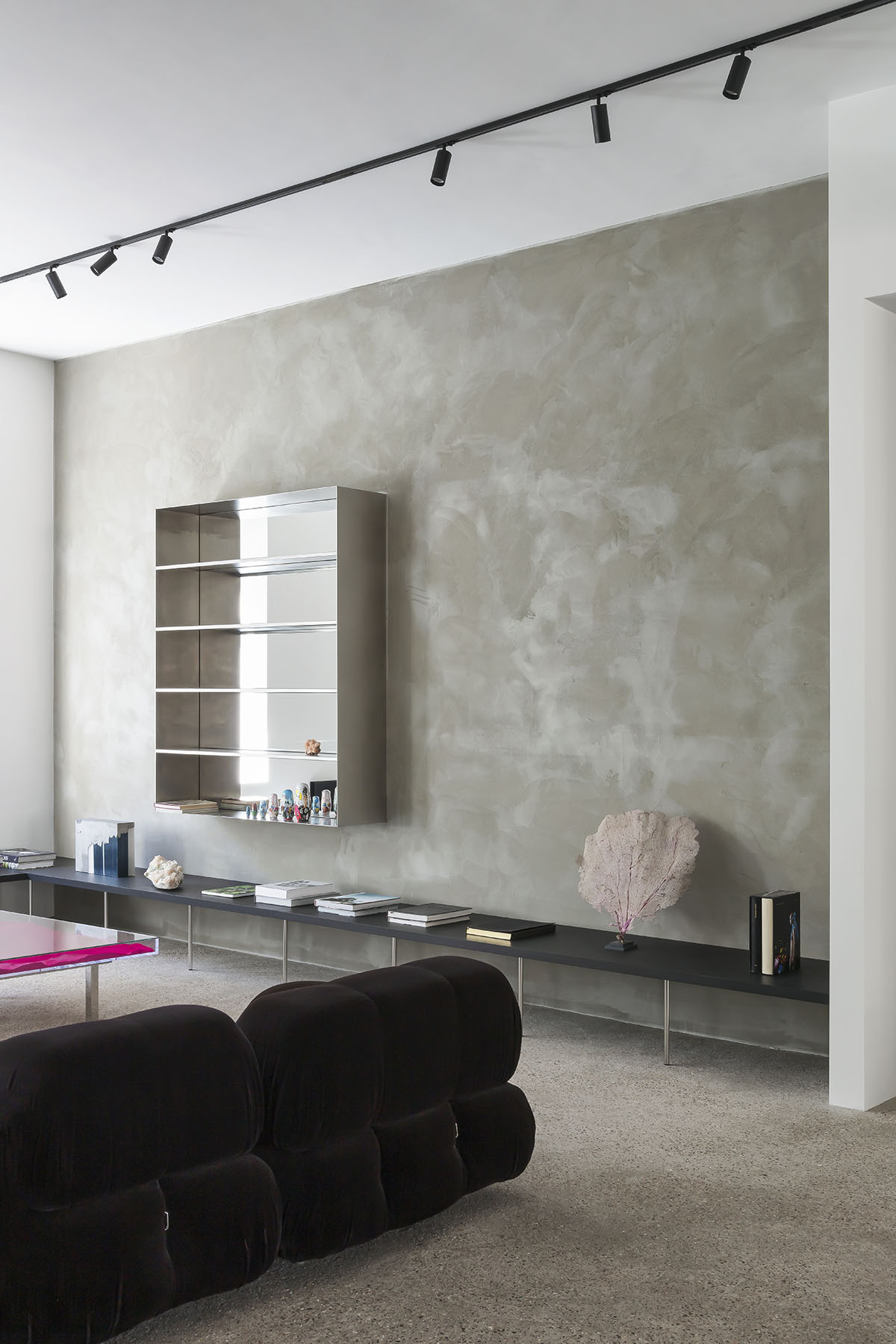 Light green, grey tones and mirrored surfaces dominate interiors of an apartment by Atelier Dialect