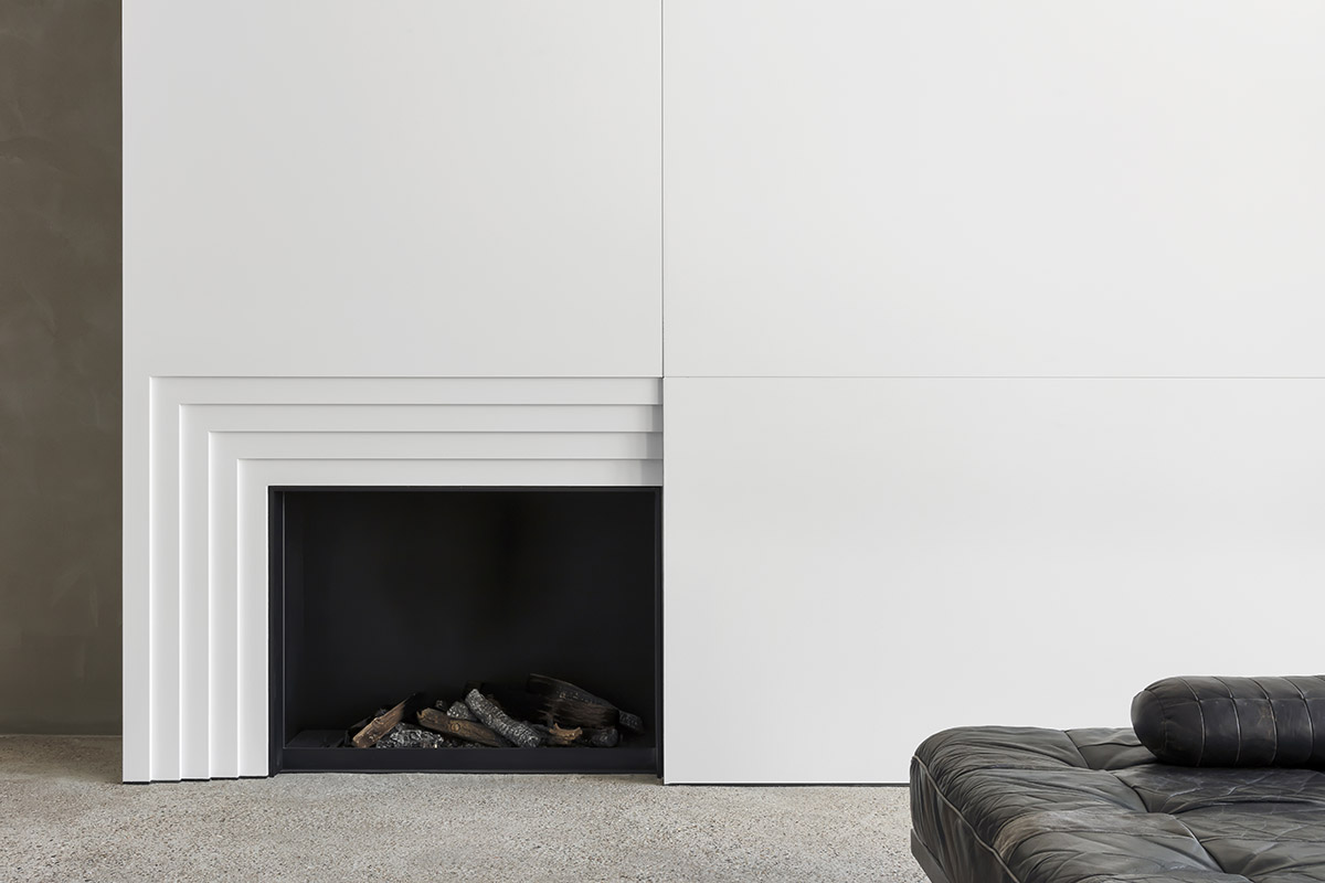 Light green, grey tones and mirrored surfaces dominate interiors of an apartment by Atelier Dialect