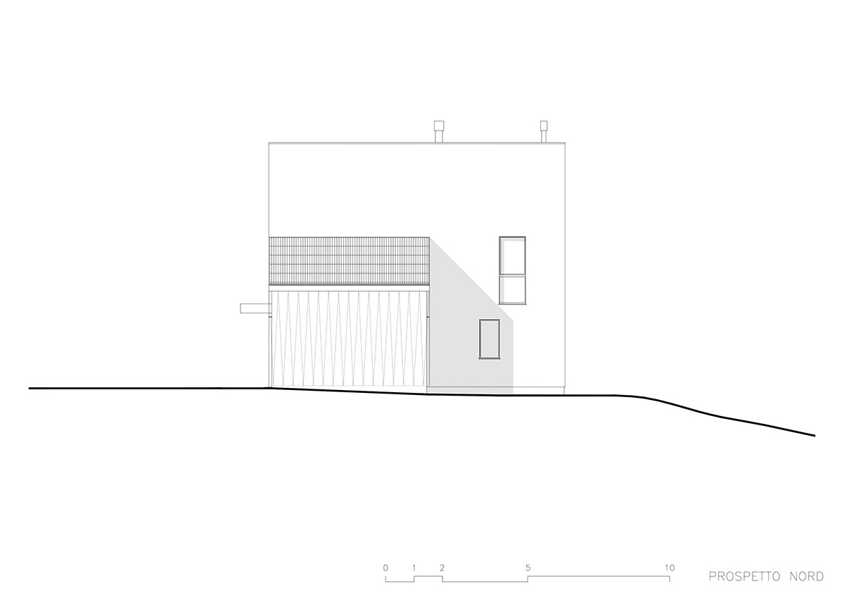 LADO architetti transforms 1970s house into a clean, monochromatic volume in Italy