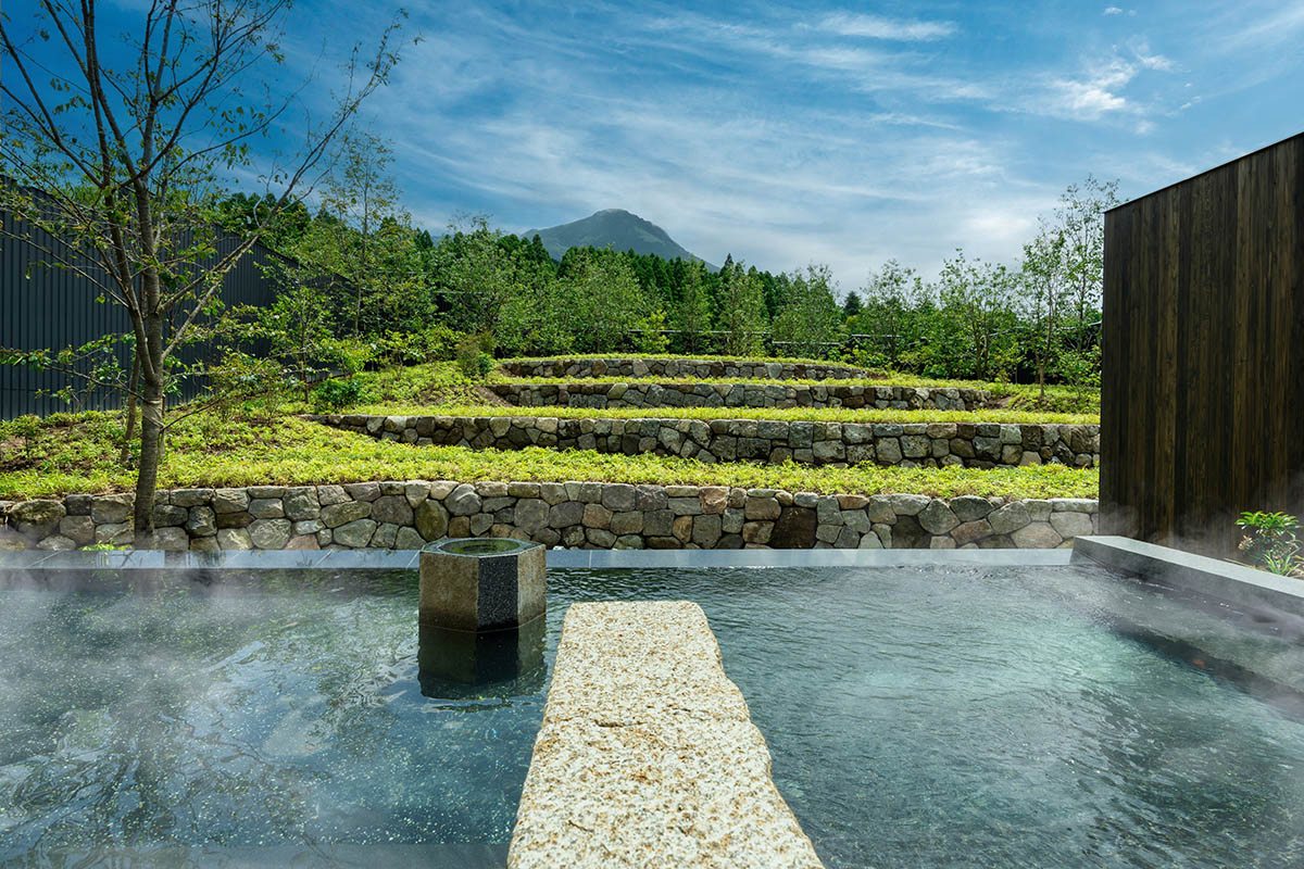 Kengo Kuma & Associates completes hot spring resort surrounded by cascading rice terraces in Kyushu