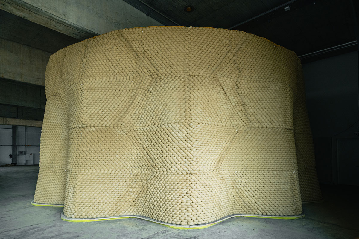 Gramazio Kohler Research used 30,000 soft clay bricks to install undulating clay rotunda in Bern