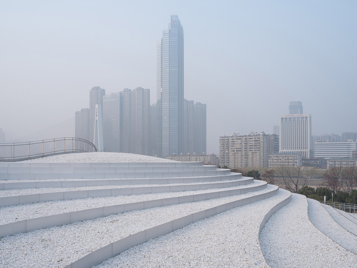 Atelier Deshaus designs mountain-looking museum with undulating topographic lines in Wuhan 