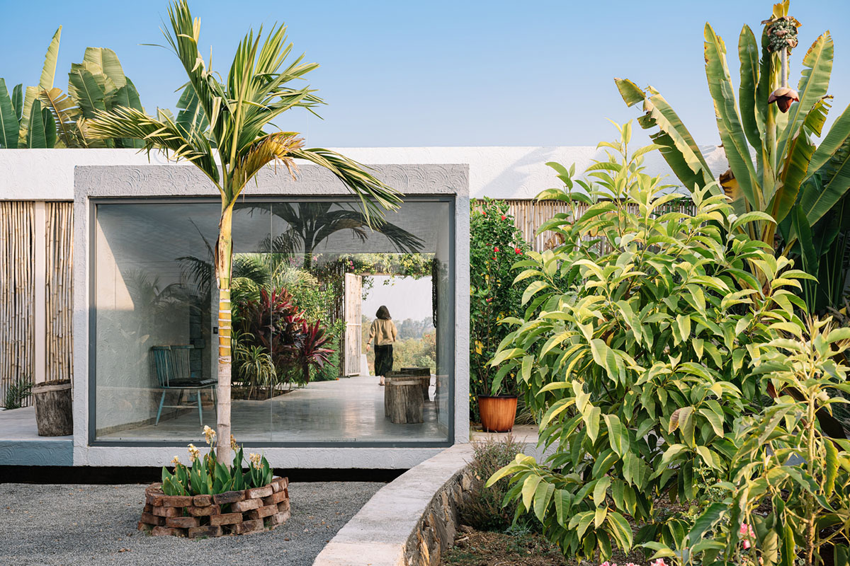 Weekend home is clad in bamboo screens that create a rustic appearance on the outskirts of Pune