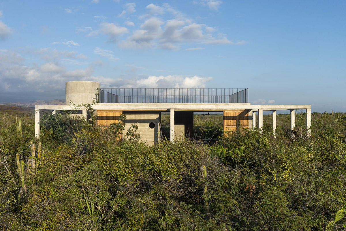Concrete columns and beams wrap Cosmos House designed by S-AR in Mexico
