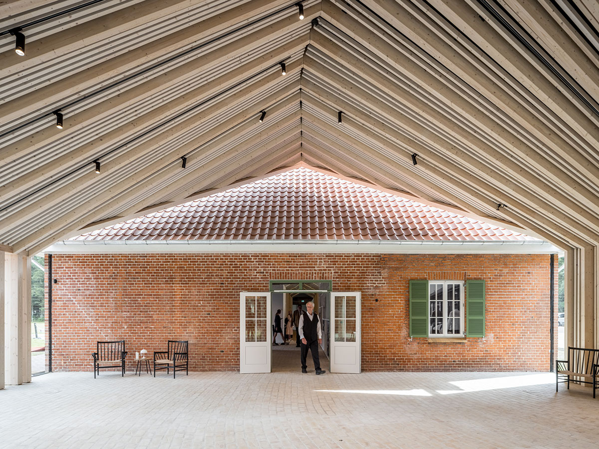 BIG completes new refugee museum in Denmark with soft curve corten steel volume