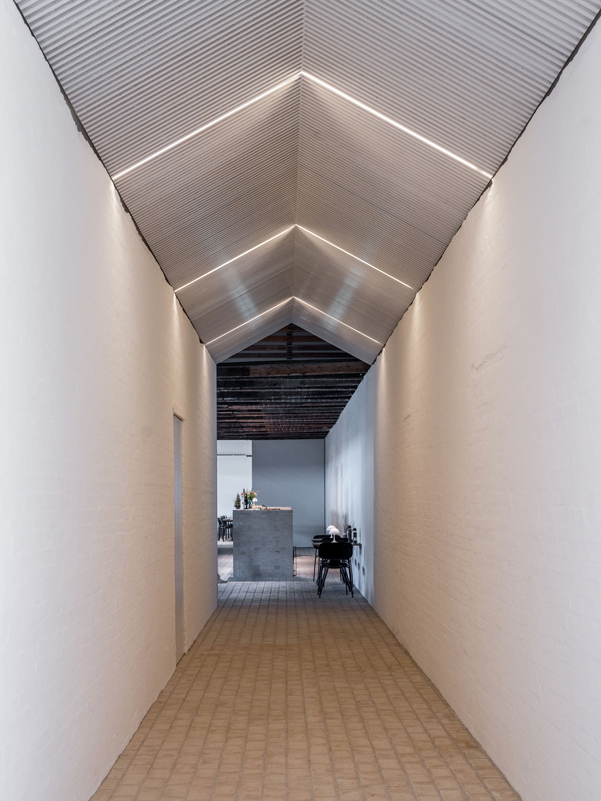 BIG completes new refugee museum in Denmark with soft curve corten steel volume