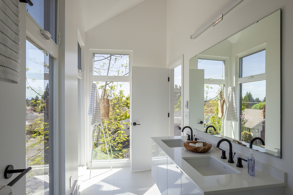 Waechter Architecture completes Origami townhouses with folded facades in Portland