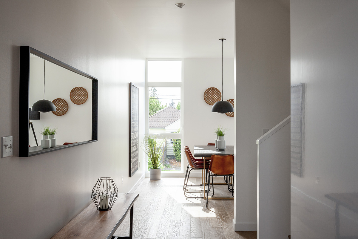 Waechter Architecture completes Origami townhouses with folded facades in Portland