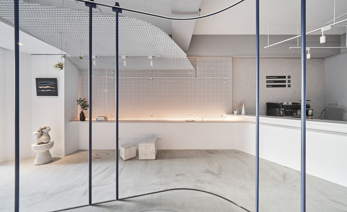 Republic Design reveals its coffee shop and gallery with curvy and white elements in Taiwan