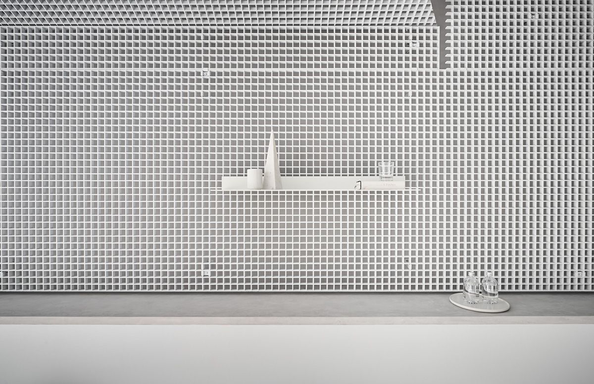 Republic Design reveals its coffee shop and gallery with curvy and white elements in Taiwan