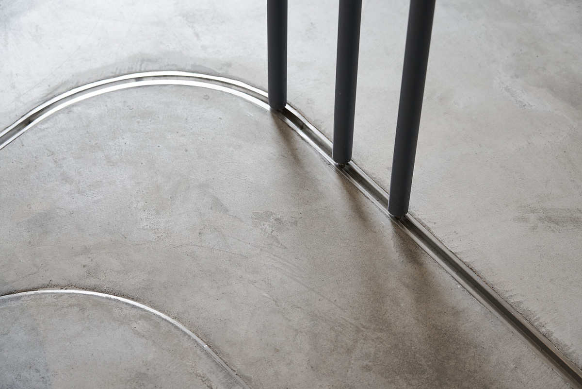 Republic Design reveals its coffee shop and gallery with curvy and white elements in Taiwan