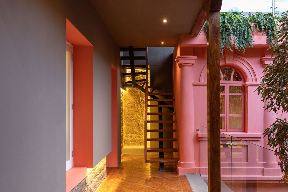 nicolas&nicolas converts old building into hotel with pinkish walls and central courtyard in Quito