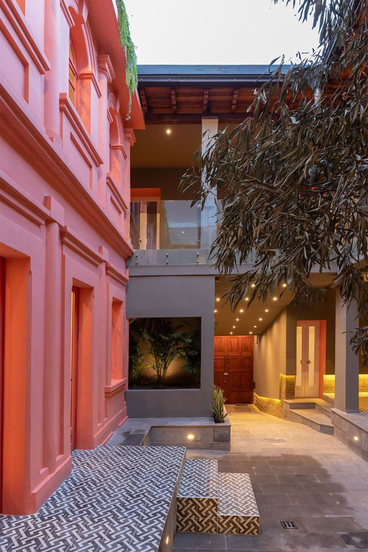 nicolas&nicolas converts old building into hotel with pinkish walls and central courtyard in Quito