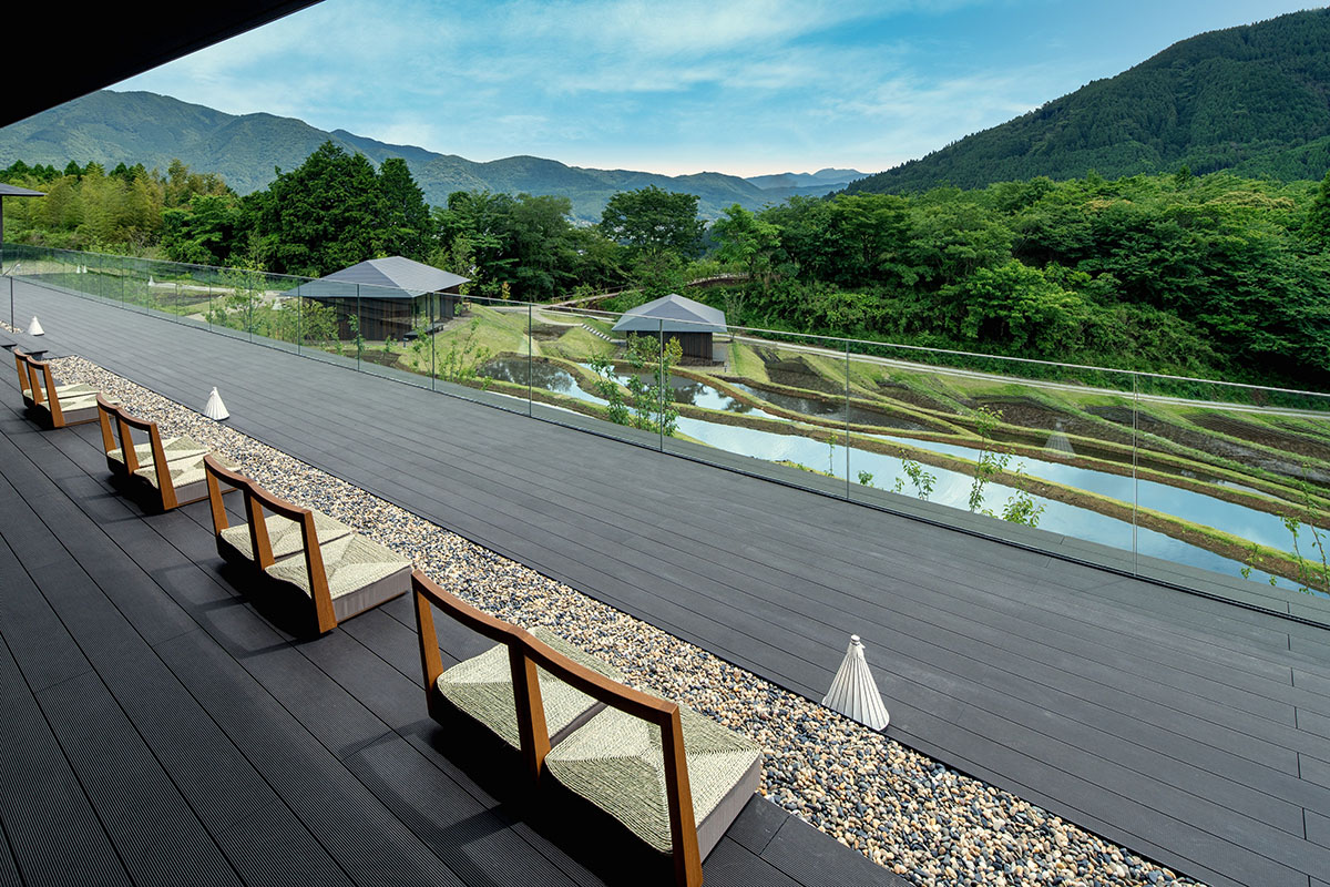 Kengo Kuma & Associates completes hot spring resort surrounded by cascading rice terraces in Kyushu