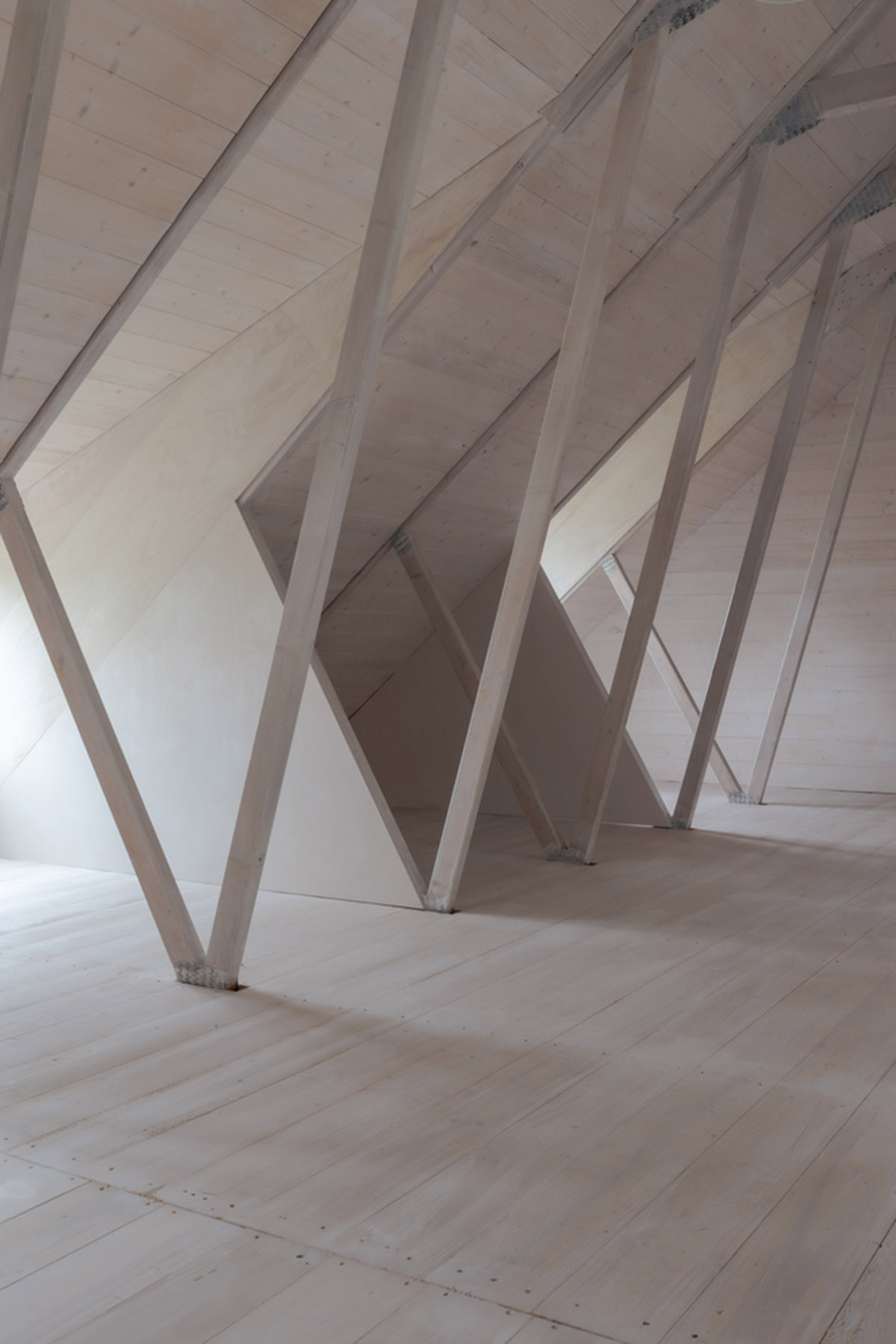 Helga Blocksdorf Architektur converts old barn into a photography studio incorporating natural tones 