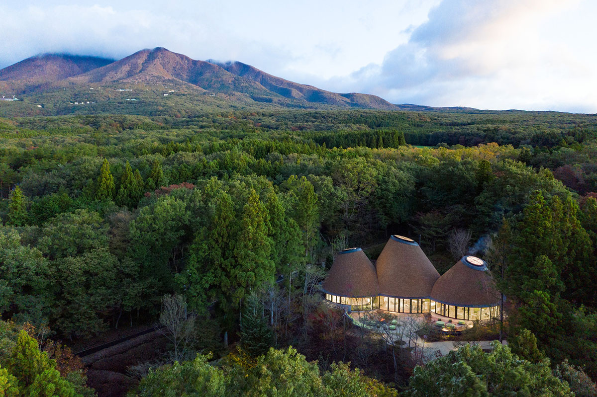 This club house by Klein Dytham Architecture offers serene atmosphere within lush forest in Japan