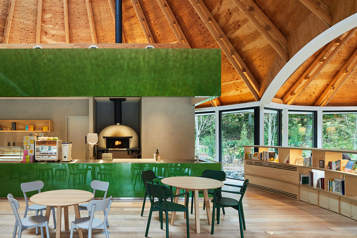 This club house by Klein Dytham Architecture offers serene atmosphere within lush forest in Japan