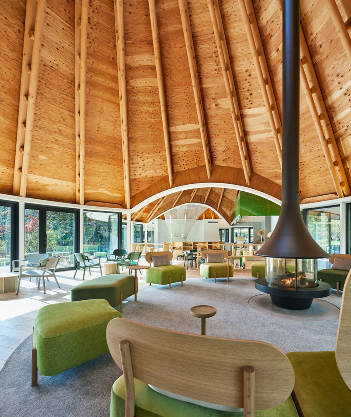 This club house by Klein Dytham Architecture offers serene atmosphere within lush forest in Japan