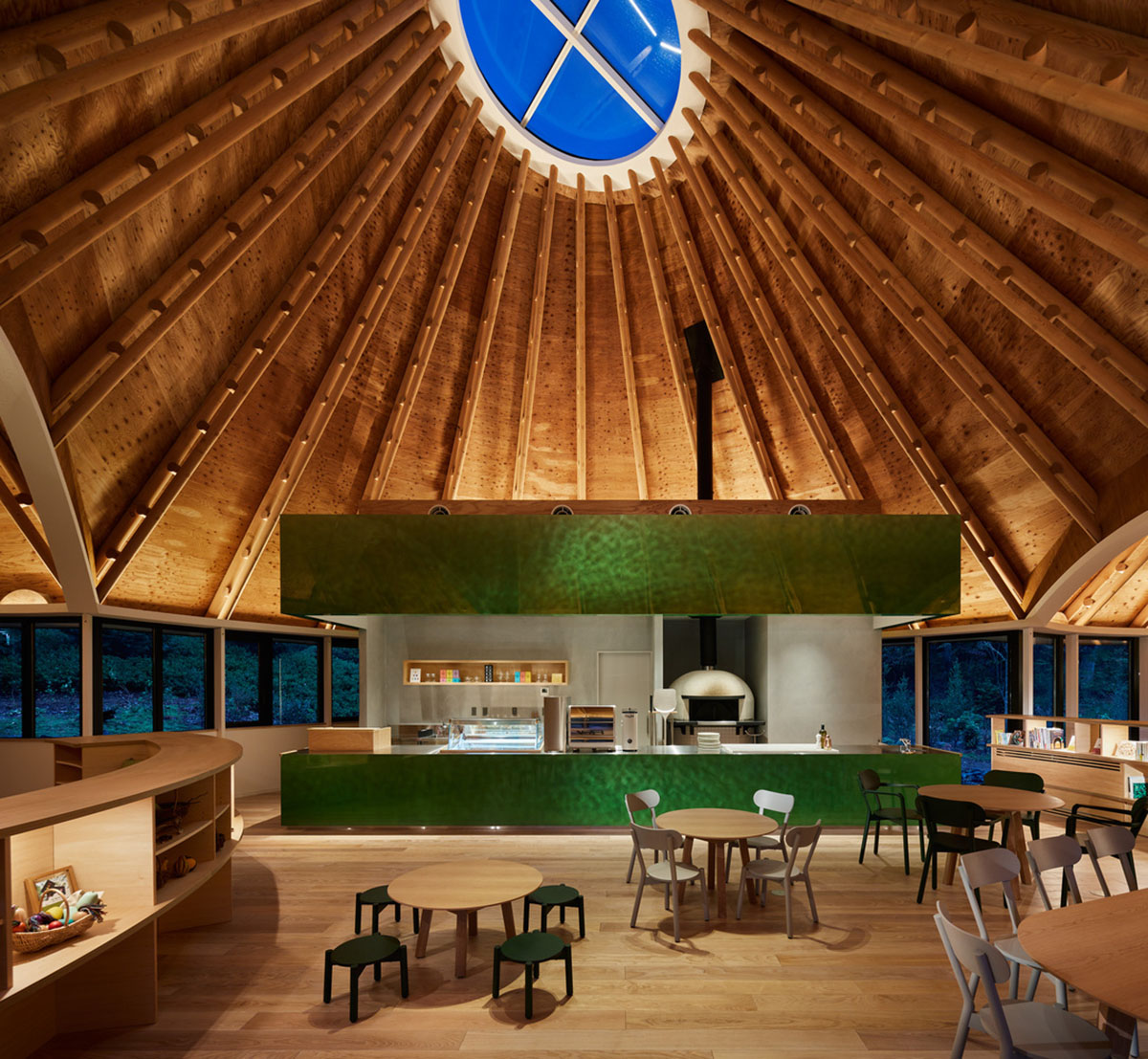 This club house by Klein Dytham Architecture offers serene atmosphere within lush forest in Japan