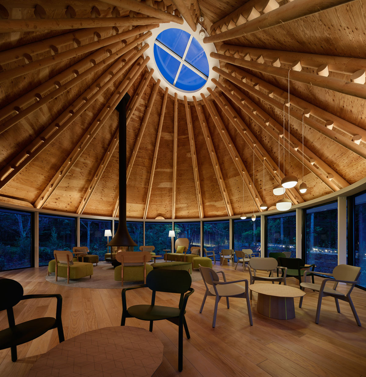 This club house by Klein Dytham Architecture offers serene atmosphere within lush forest in Japan