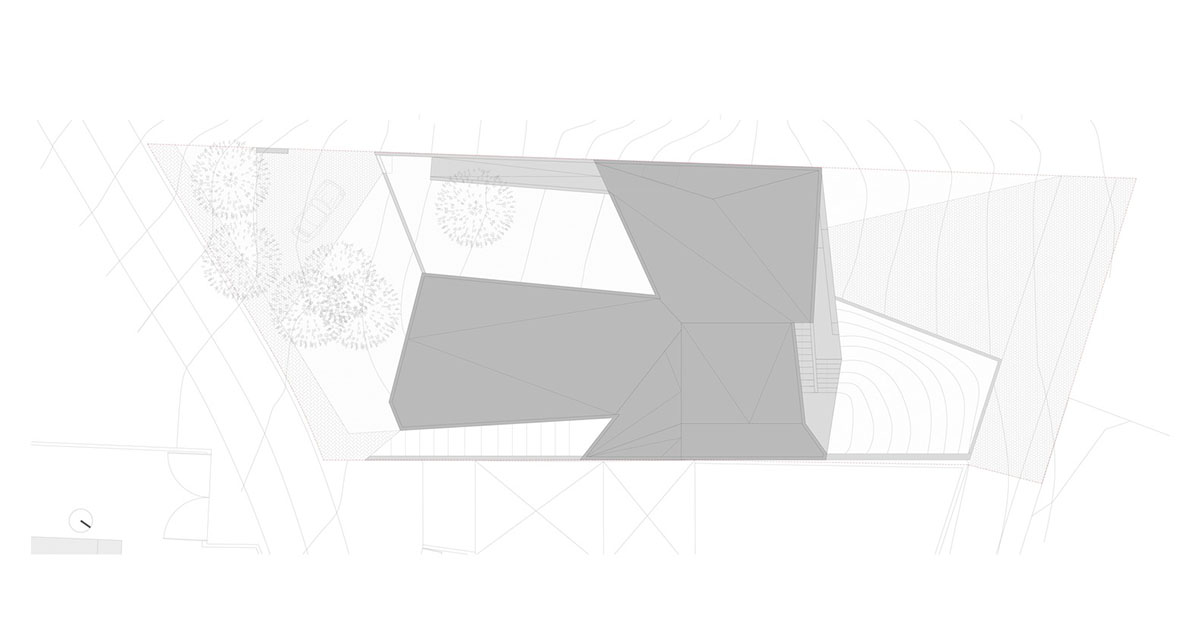 Contaminar Arquitectos built cave-like house from irregular walls inspired by rocky topography
