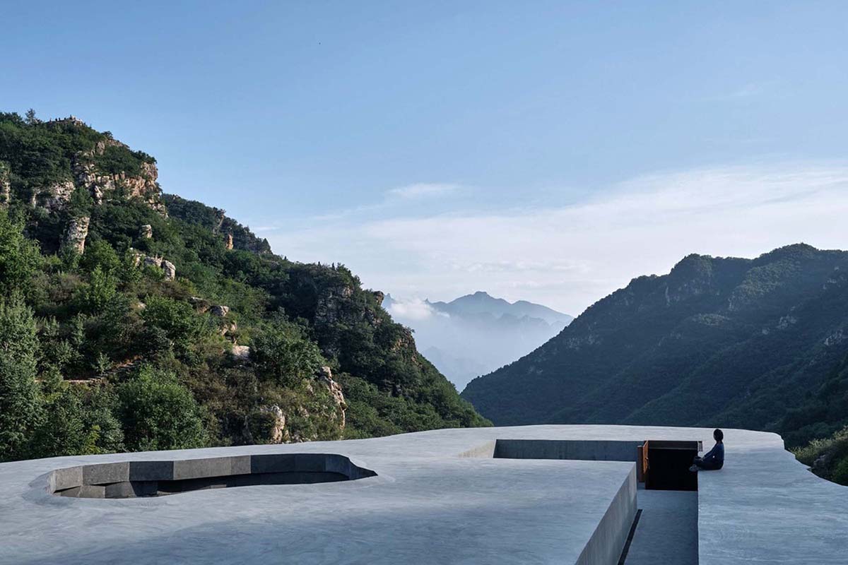 OPEN Architecture designs monolithic rock-like open-air concert hall in the north of Beijing